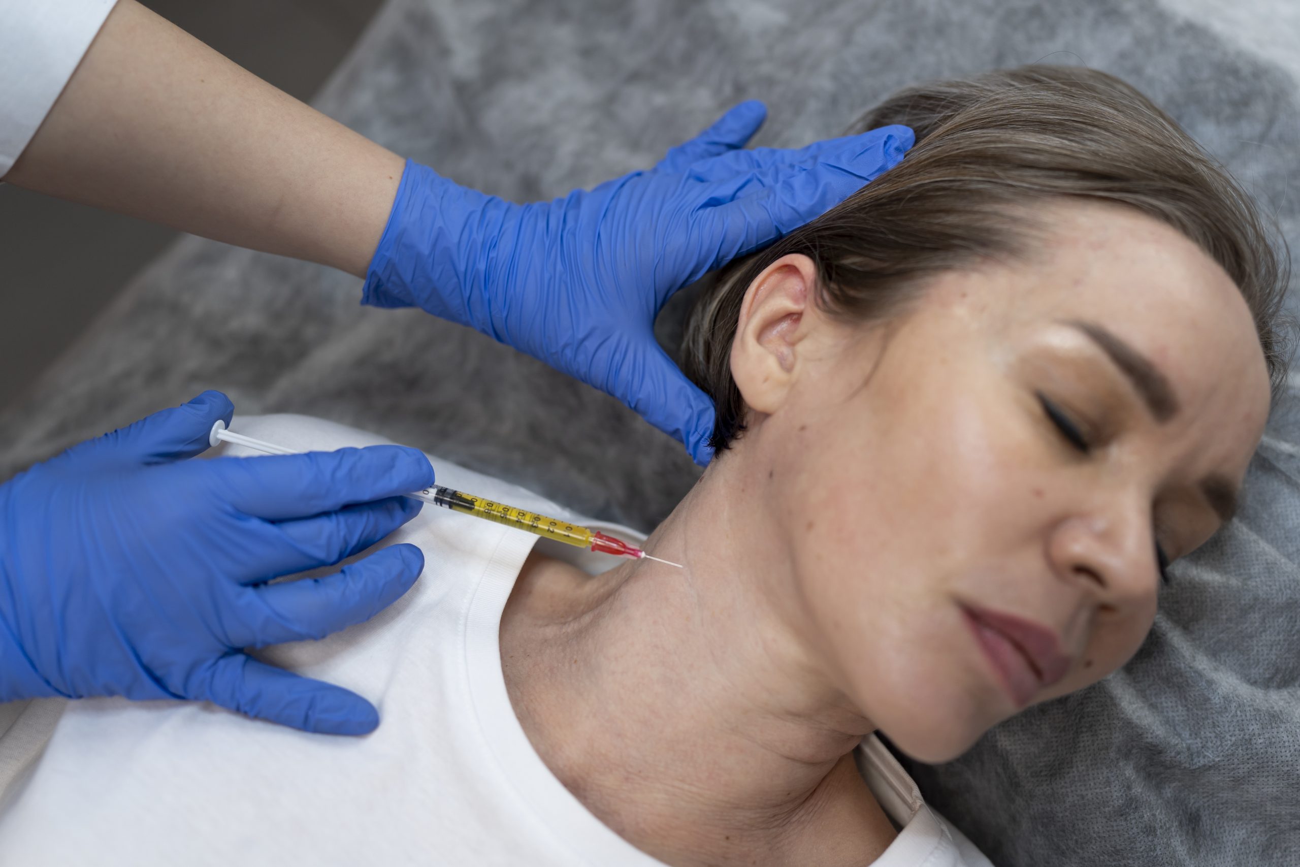 flat lay woman getting prp injection